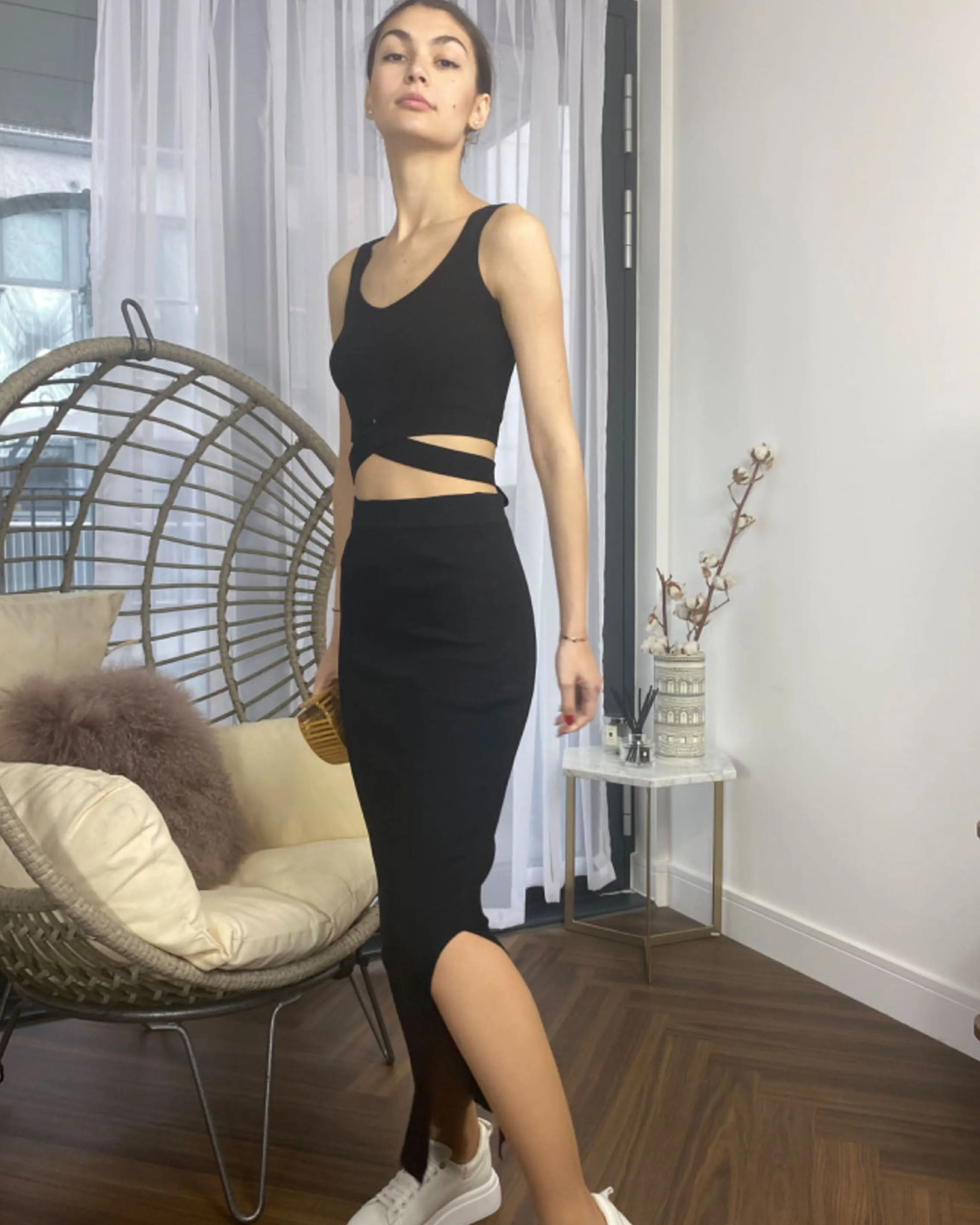 Knitted bodycon style vest top with tie up design and midi pencil skirt co-ords set in black